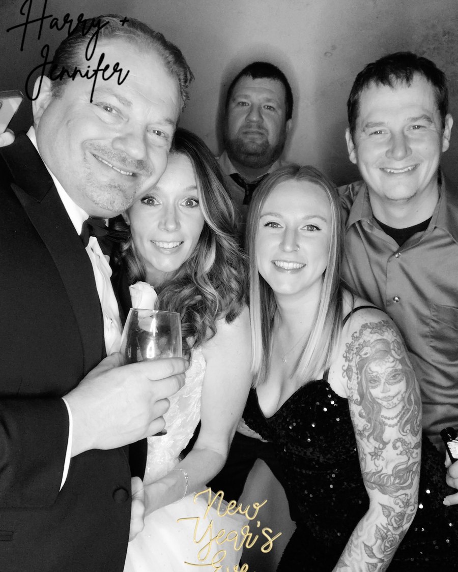 A glam black-and-white group capture at the booth