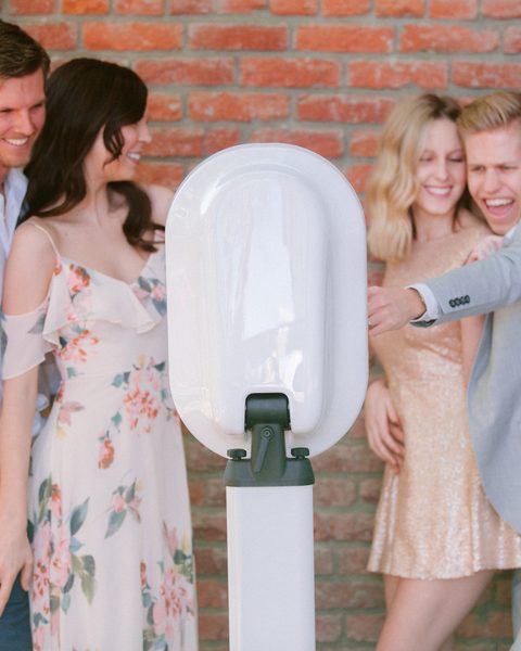 Guests at a Primo photo booth
